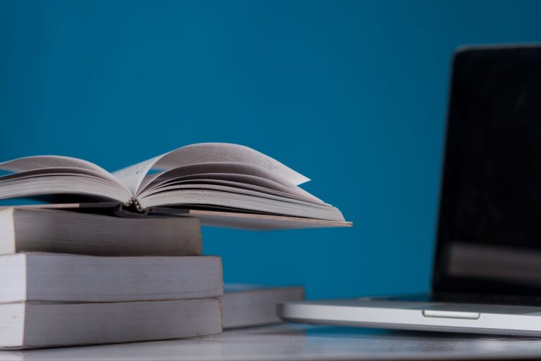 Books and laptop on the table