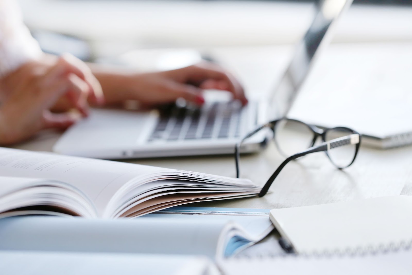 Close up of woman working in laptop at the office